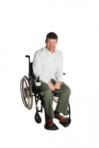 a photo of laurence clark in his wheelchair.